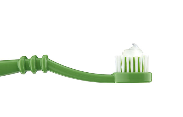Toothbrush with clear toothpaste